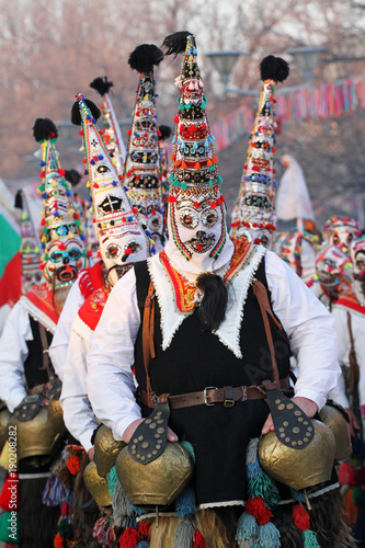 Kukeri, mummers perform rituals with costumes and big bells, intended to scare away evil spirits during the international festival  of masquerade games ”Surva” in Pernik. Foklore