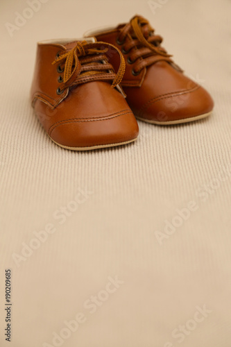 Brown leather baby shoes