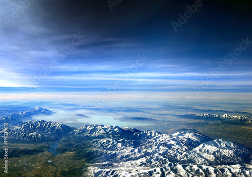Flying over Utah, USA - looking towards Utah lake over the Wasatch Mountains photo