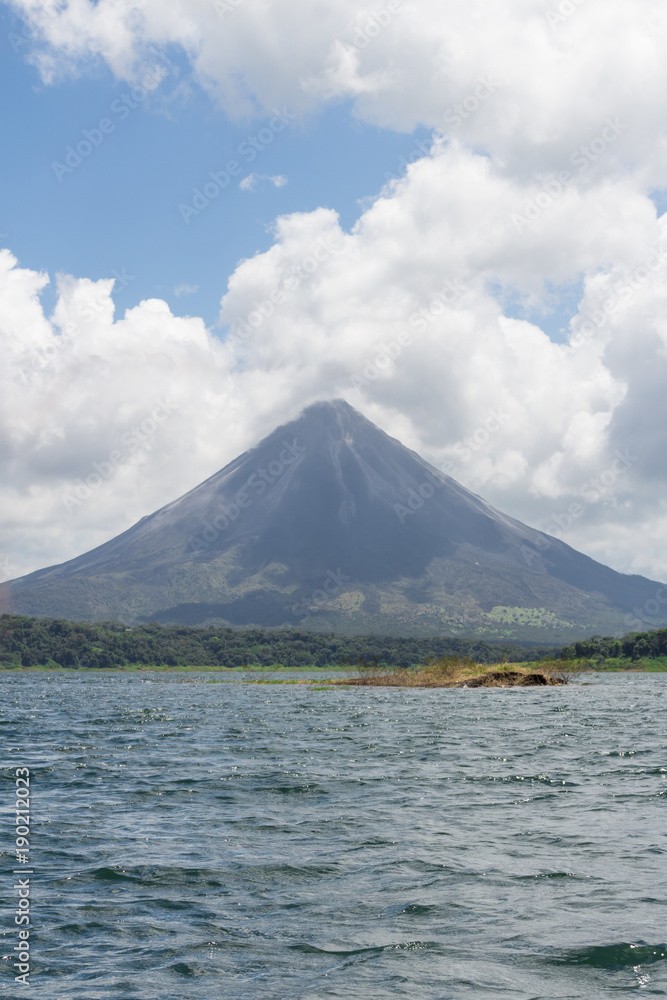 Arenal Volcano in Costa Rica seen from a nearby lake