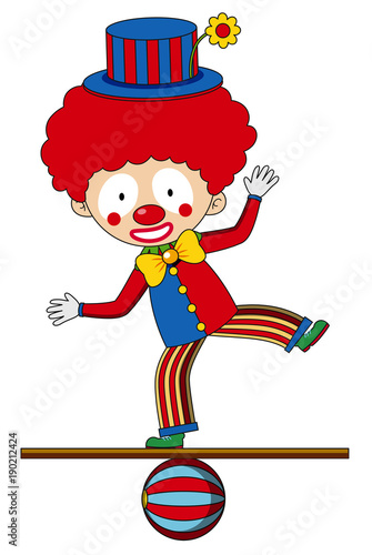 Circus clown standing on the ball