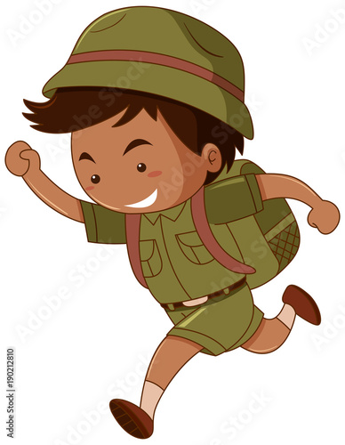 Little boy in green costume with backpack