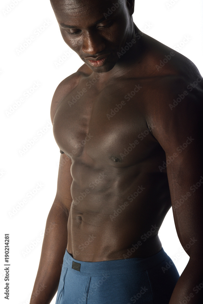 Fototapeta premium portrait of a muscular man on white background