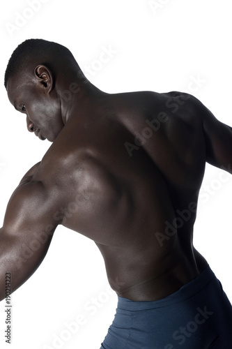 portrait of a black athletic man on his back