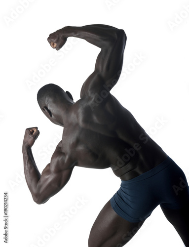 portrait of a black athletic man on his back