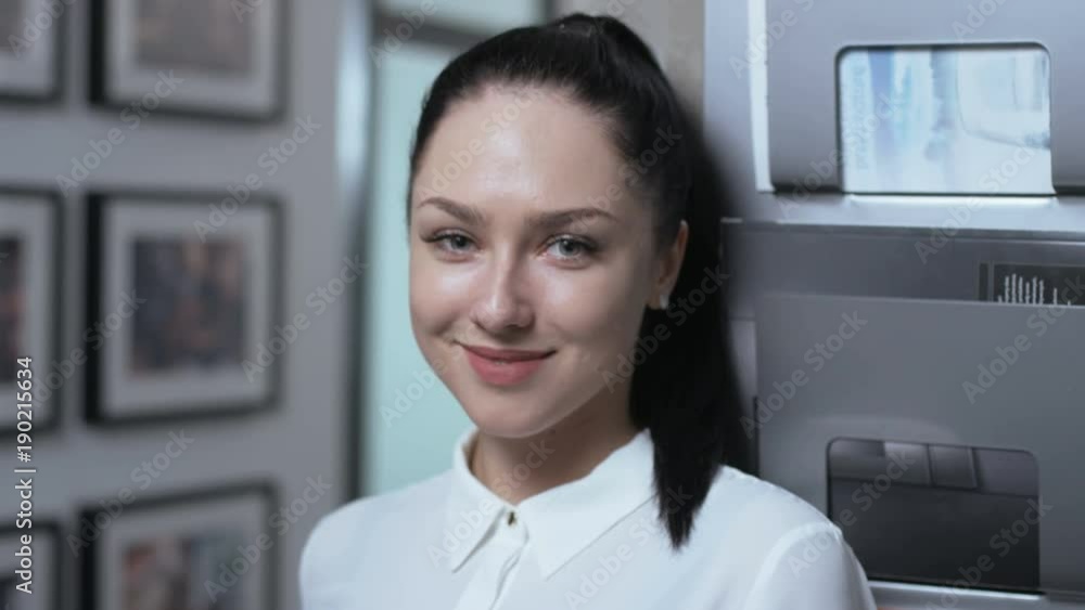 Young Businesswoman Turning her Head to the Camera Young Businesswoman Turning her Head to the Camera