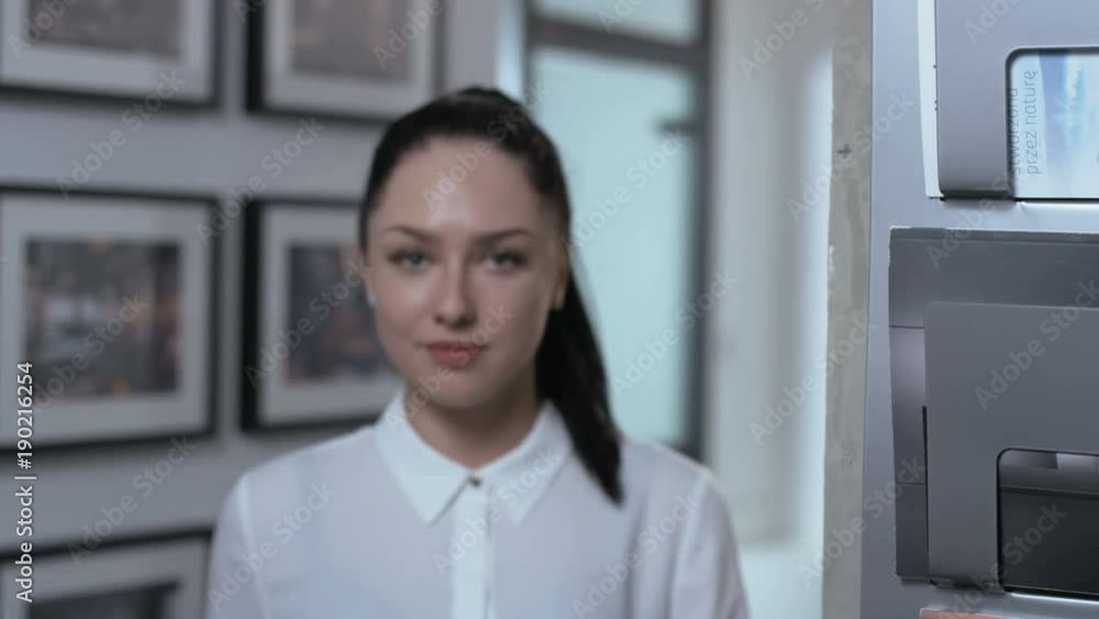 Young Businesswoman Walking to the Camera and Smiling Young Businesswoman Walking to the Camera and Smiling