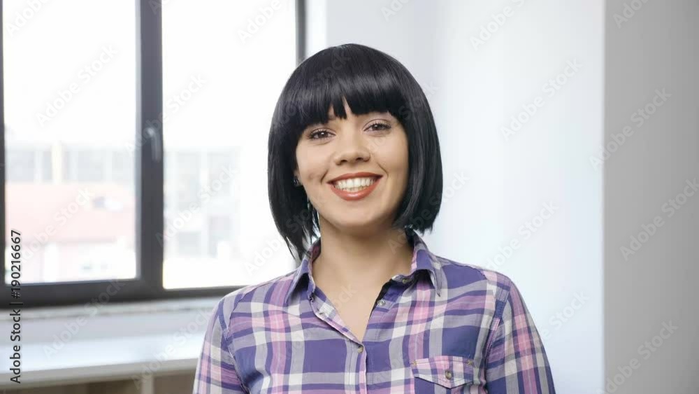 Slow motion portrait of beautiful brunette woman smiling Slow motion portrait of beautiful brunette woman smiling