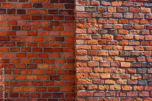 Red brick wall. The example of brickwork as exterior wall facing.