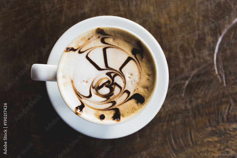 coffee art in white cup on table wood coffee shop cafe coffee art in white cup on table wood coffee shop cafe