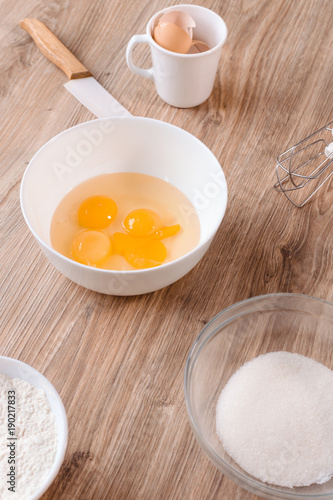 Fresh egg yolks in a porcelain bowl