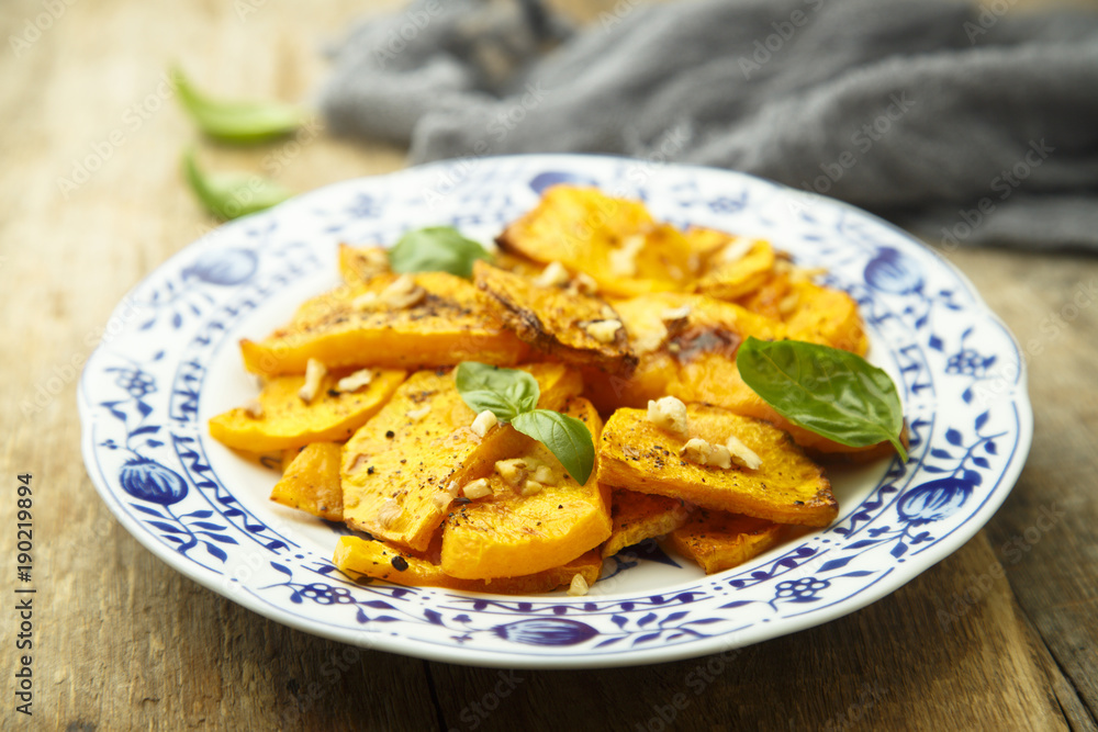 Baked pumpkin with honey glaze and nuts Baked pumpkin with honey glaze and nuts