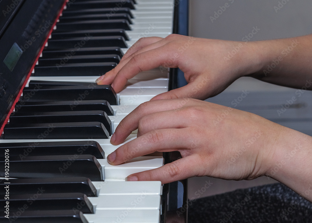 hands of a pianist close-up hands of a pianist close-up