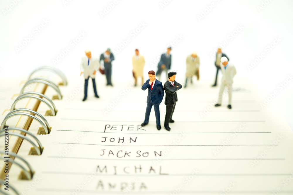 Miniature people, business team standing with copy space using as business and human resource concept Miniature people, business team standing with copy space using as business and human resource concept