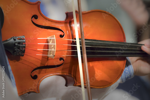 detail of a violin during playing, folklore