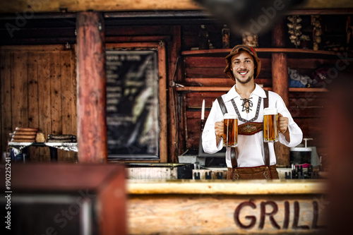 Bavarian man and his own small business. Grill bar interior.  © magdal3na