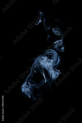 Blue smoke swirl on a black bacground