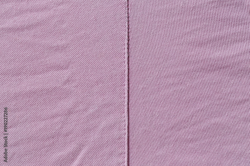 Fototapeta premium Purple fabric texture of surface textiles background.