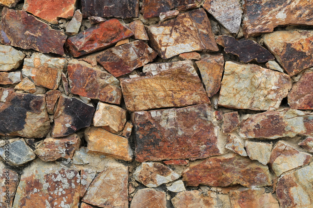 Brown stone surface of wall background. Brown stone surface of wall background.