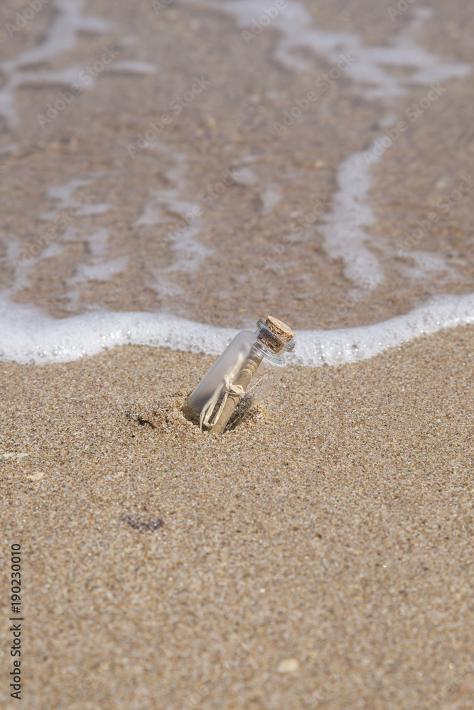 message in a bottle on beach