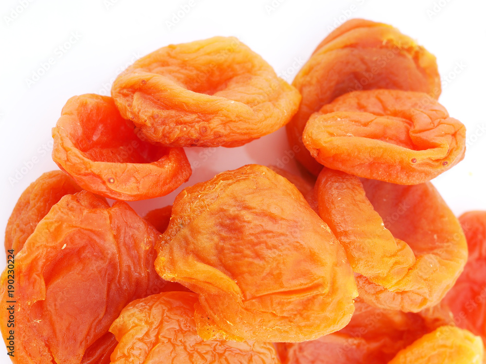 dried apricots on a white background dried apricots on a white background