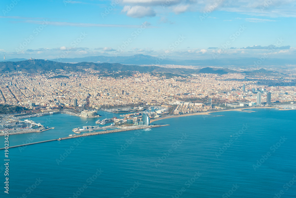 Aerial view of the city of Barcelona.  In the aircraft above the city, shortly before landing