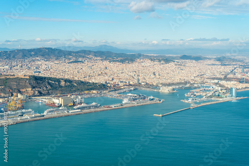 Aerial view of the city of Barcelona. View to Port Vell In the aircraft above the city, shortly before landing