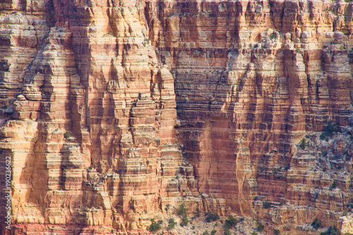 The layered rock faces of the cliffs of the Grand Canyon providing copy space.