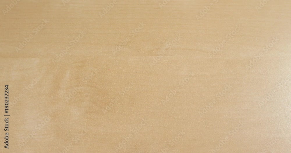 Hand creasing paper into a ball Hand creasing paper into a ball