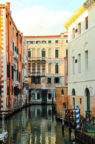 A quiet, empty canal in Venice, Italy © Jason Yoder