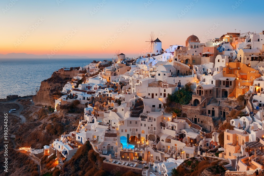 Obraz premium Santorini skyline sunset windmill