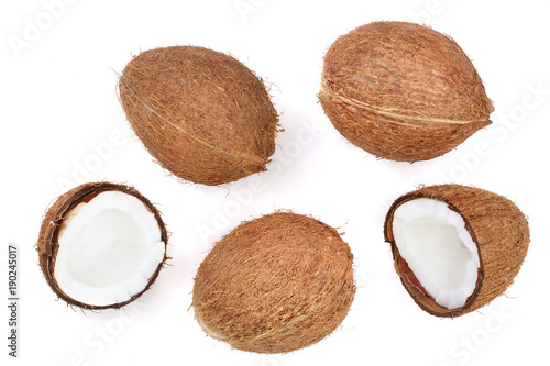 whole coconut with half isolated on white background. Flat lay. Top view