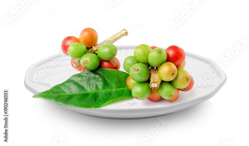 coffee beans in plate on white background