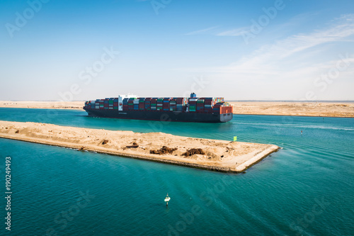 Container cargo ship sailing on Suez Canal. photo