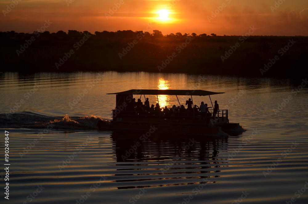 A boat ride and river safari during sunset