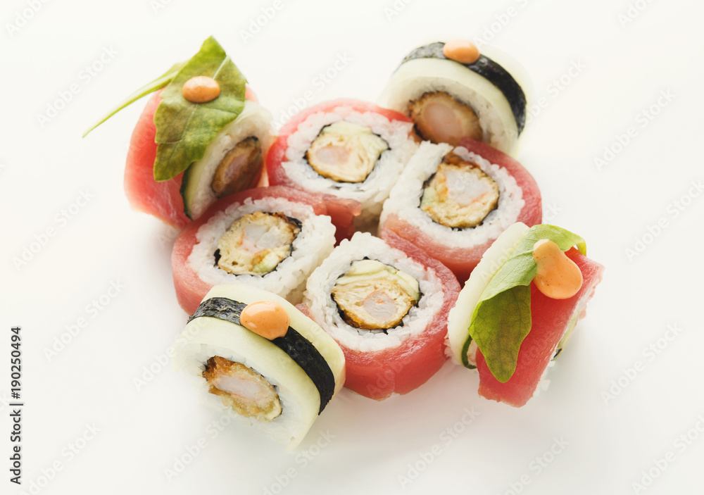 Set of fish rolls isolated on white, closeup Set of fish rolls isolated on white, closeup