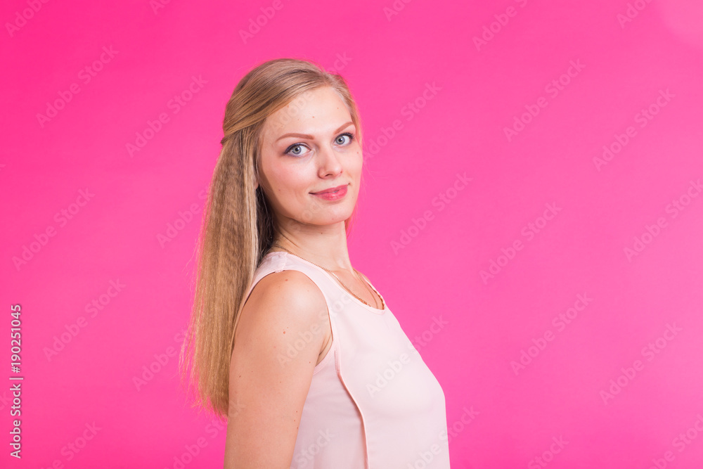 Happy Blonde Woman on pink background. Smiling Fashion Model with Hairstyle Happy Blonde Woman on pink background. Smiling Fashion Model with Hairstyle