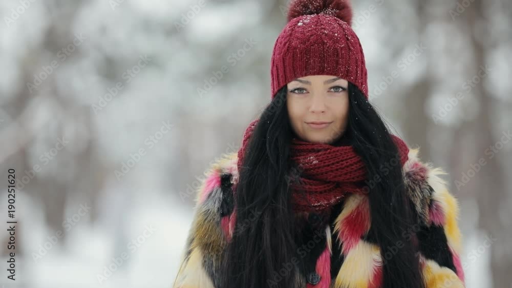 Portrait of don't moving woman in hat at frost winter Portrait of don't moving woman in hat at frost winter