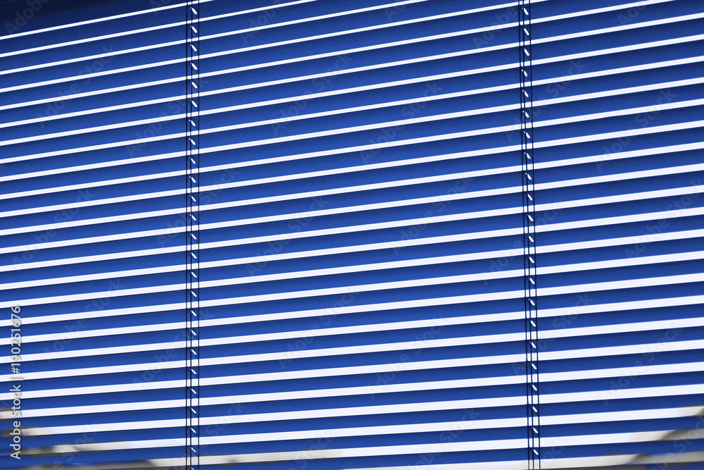 Obraz premium Horizontal window blinds in blue