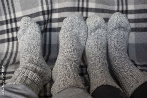 Feet in woollen socks