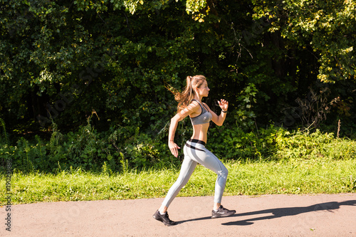 healthy lifestyle young fitness woman running outdoors