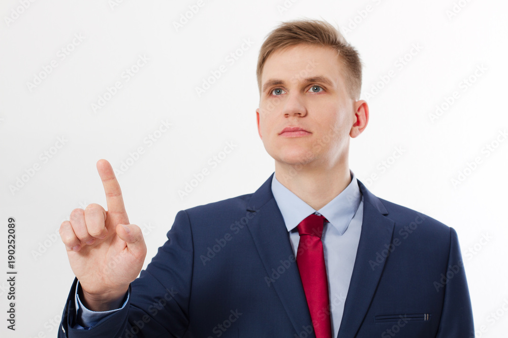 Stylish Businessman point on virtual screen isolated on white background. Selective focus on pointing finger. Business success concept Stylish Businessman point on virtual screen isolated on white background. Selective focus on pointing finger. Business success concept