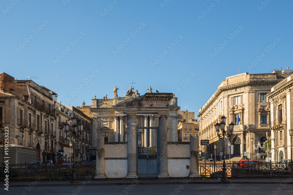 Fototapeta premium Piazza Stesicoro and the entrance to the Roman Amphitheatre of Catania, Sicily, Italy