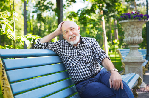 Smiling senior man outdoors