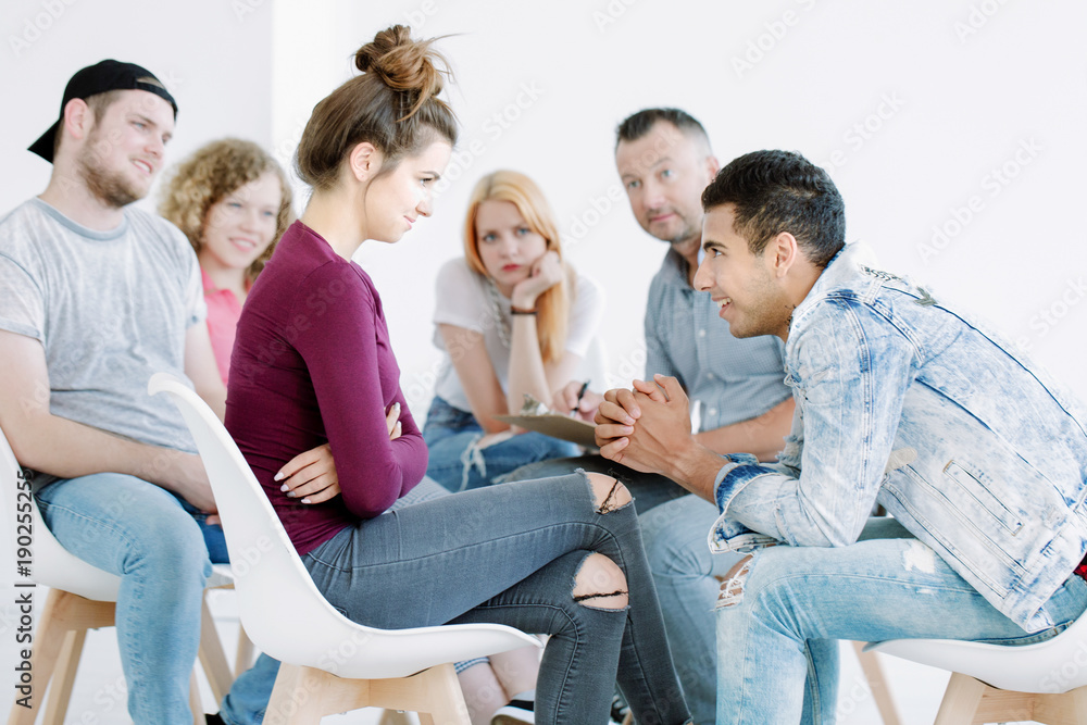 Young man talking with girlfriend Young man talking with girlfriend