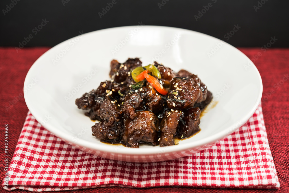 wok fried pork stir fry with sweet peppers and chinese vegetables wok fried pork stir fry with sweet peppers and chinese vegetables