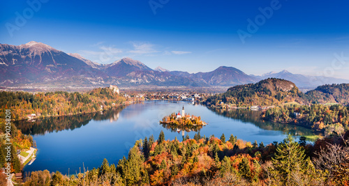 Amazing view on Bled Lake, Island, Church And Castle with mountain range in the background. Top view Bled, Slovenia, Europe