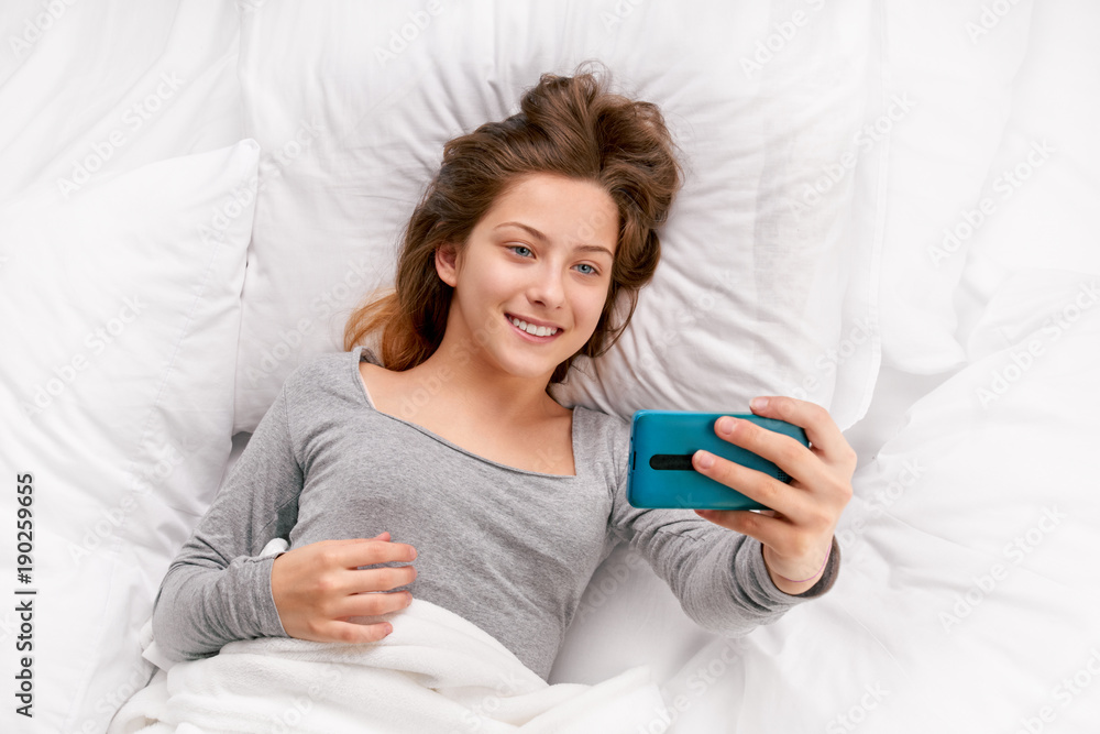 Selfie in white bed Selfie in white bed
