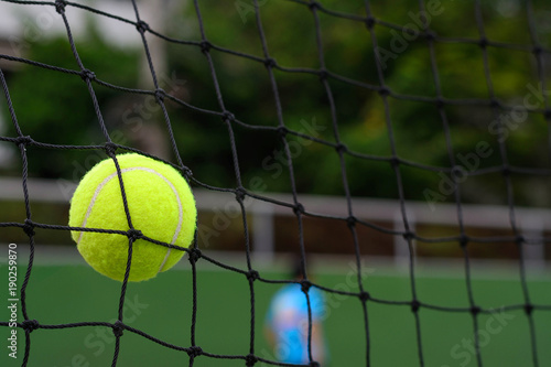 Close up Tennis ball hitting to net © WK Stock Photo 