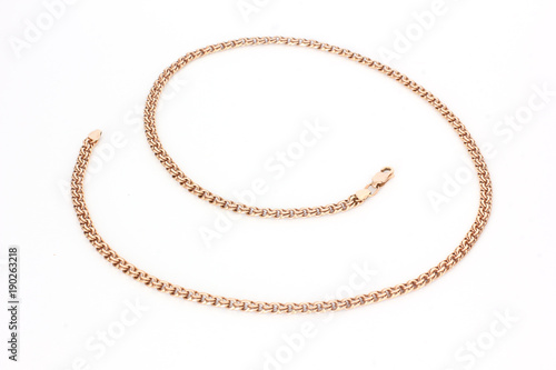 Gold chain on a white background. Gold
